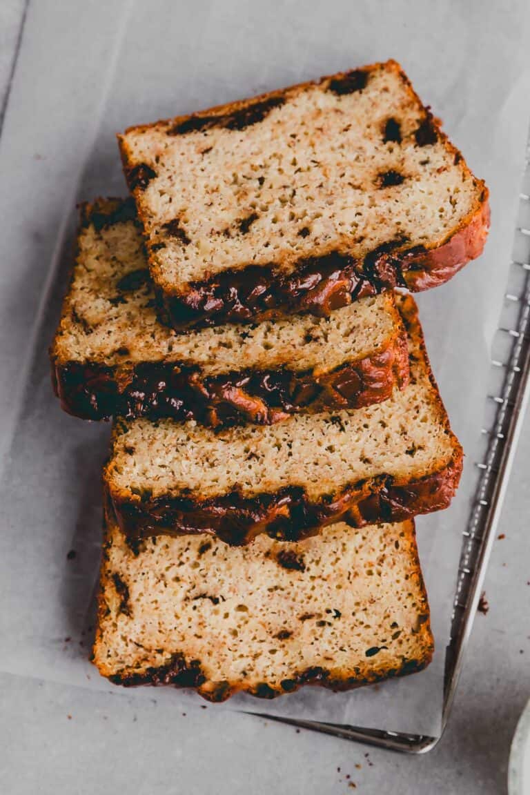 protein banana bread sliced on a wire rack